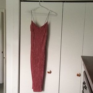 Uniquely red, textured midi dress.